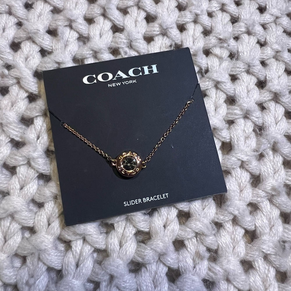 Coach Black and Gold Slider Bracelet